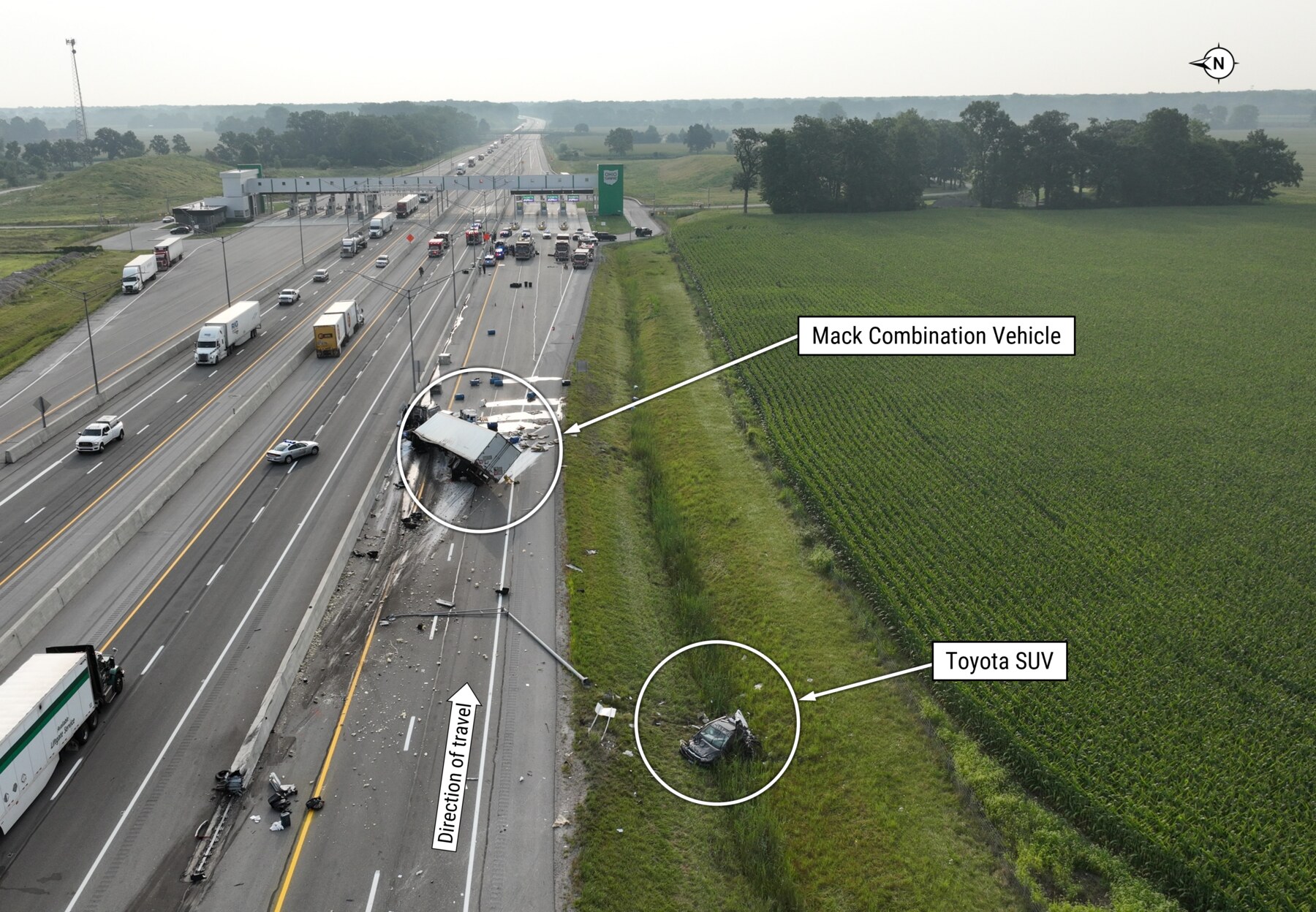 Annotated NTSB investigation image showing the toll plaza, roadway, truck and SUV crash positions